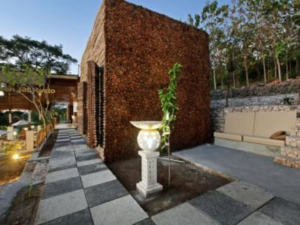 Small building with a garden path Kabeh Jati Garden Villa & Restaurant