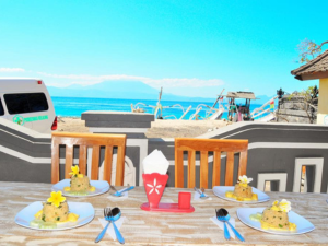 dining table with beach view Deva Devi Beach Inn