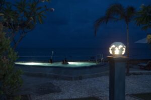 swimming pool with night view Cemara’s Beach Homestay